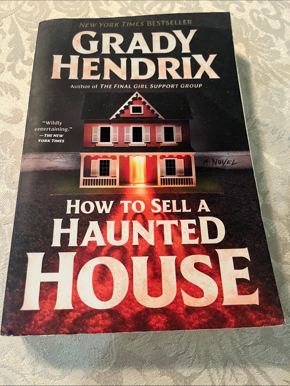 Grady Hendrix "How to Sell a Haunted House" Paperback Book - Black, Red